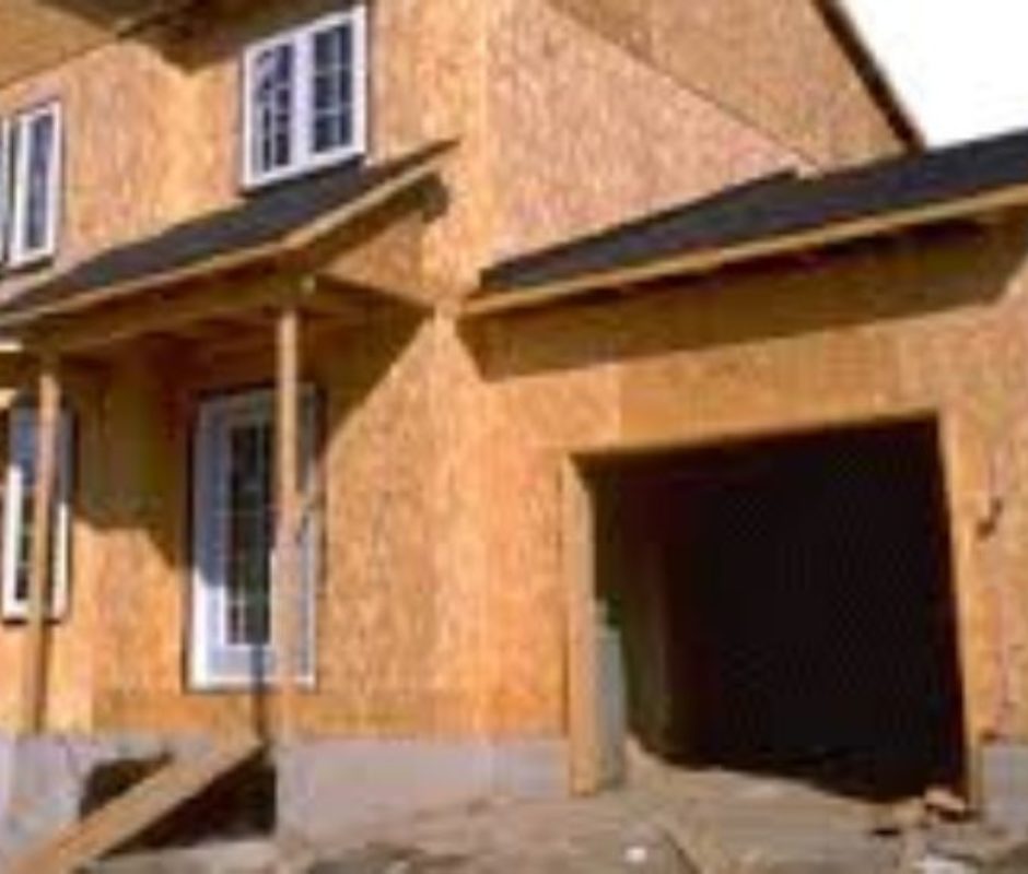 A house with some windows and doors in it