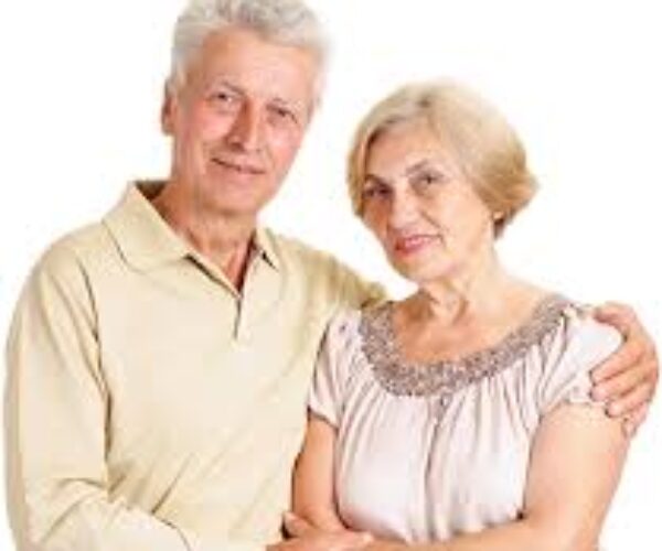 A man and woman posing for the camera.