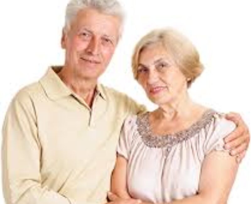 A man and woman posing for the camera.