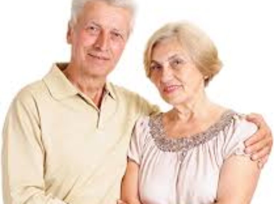 A man and woman posing for the camera.