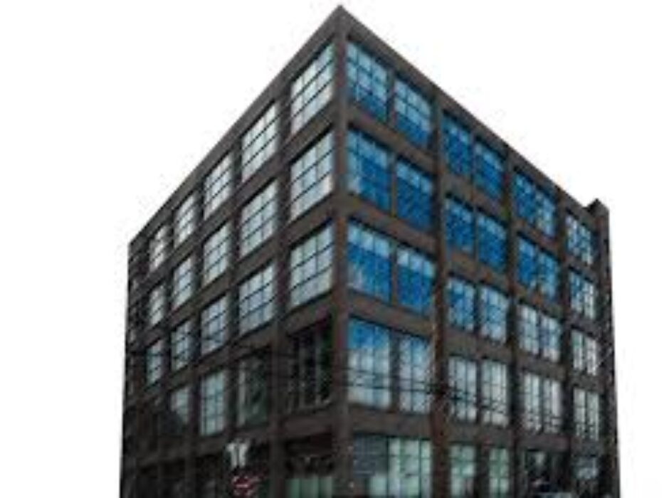 A large building with many windows on the outside.
