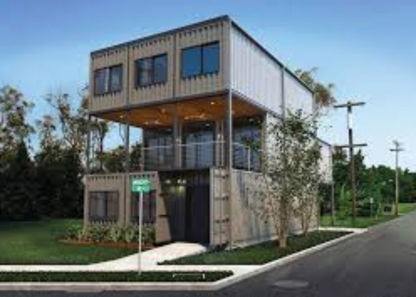 A large house made out of shipping containers.