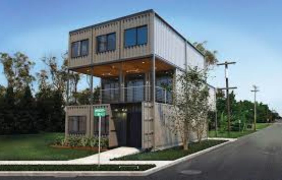 A large house made out of shipping containers.