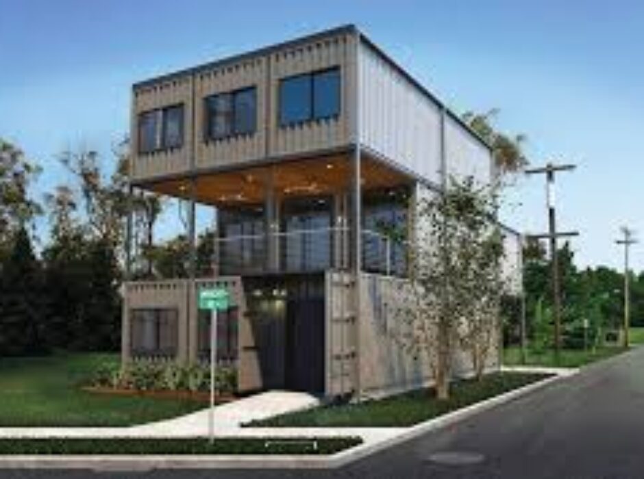 A large house made out of shipping containers.