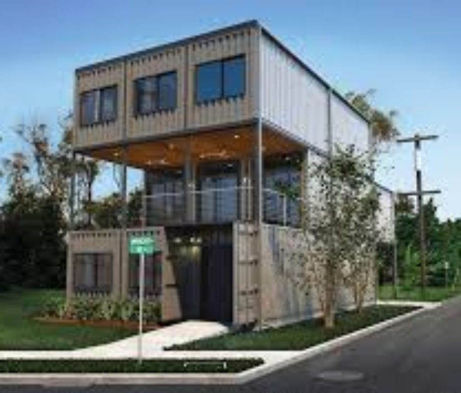 A large house made out of shipping containers.