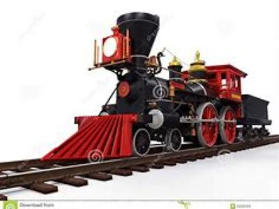 A red and black train on tracks with the top of it.