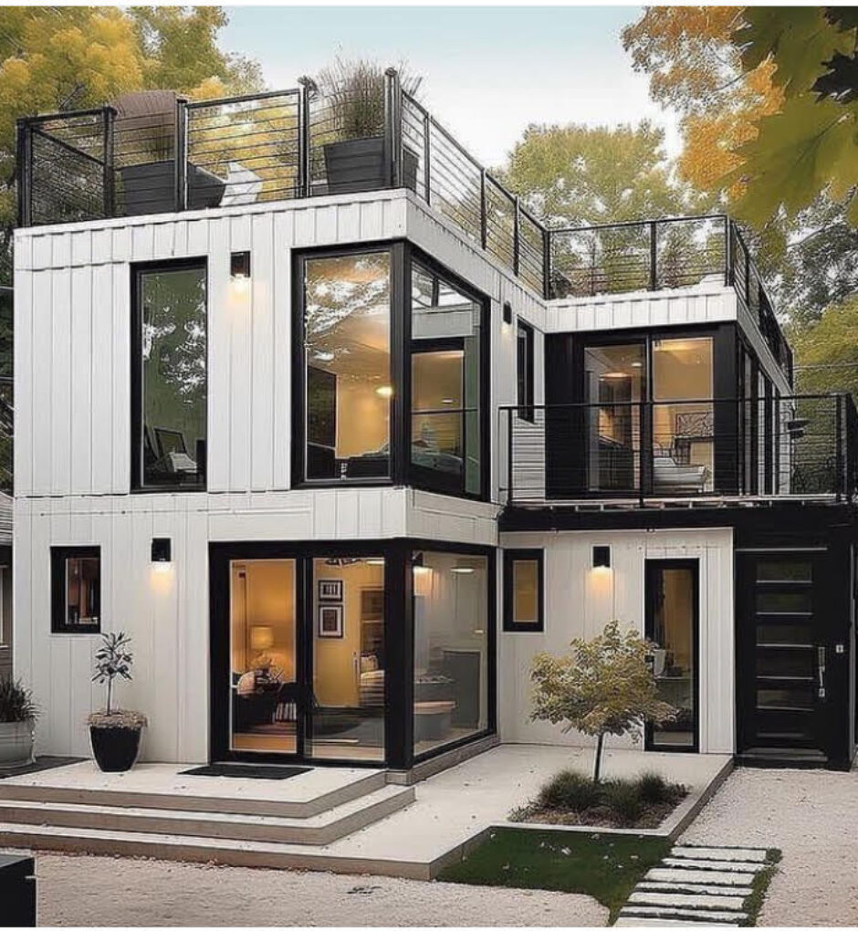 A modern house with many windows and doors.